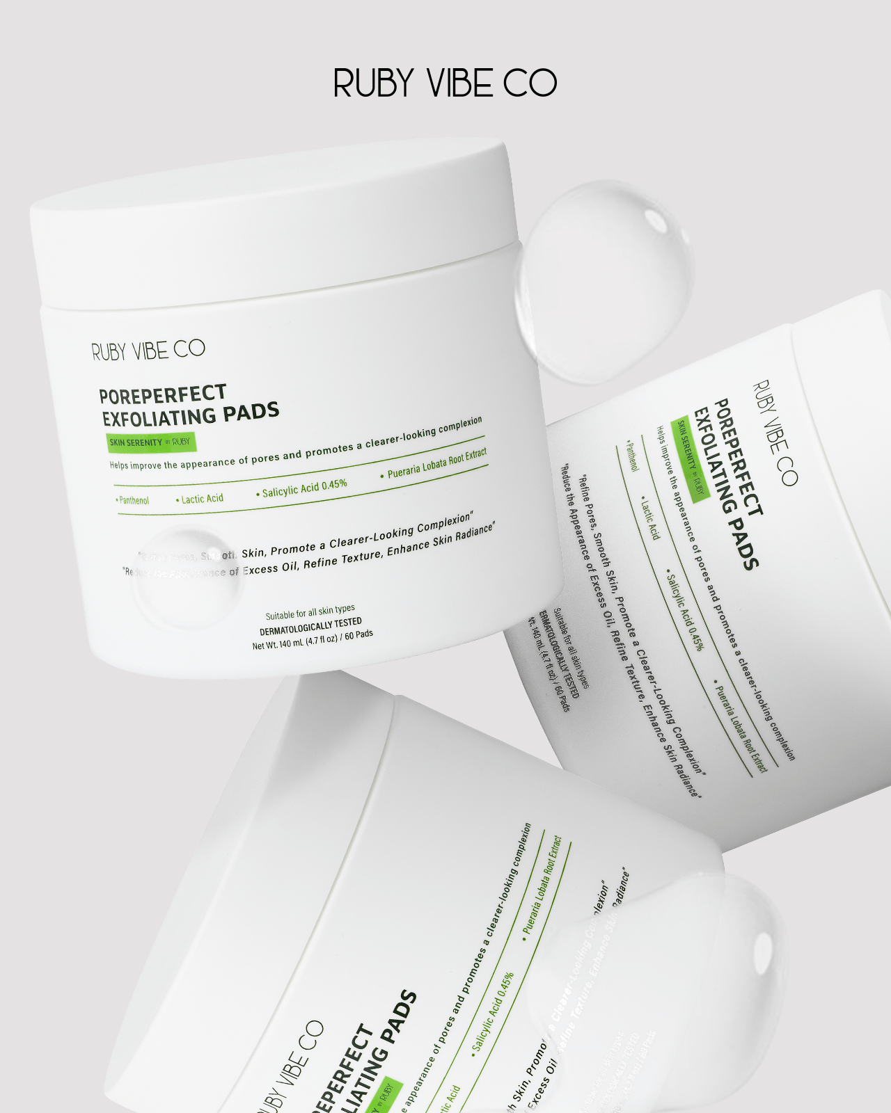 An overhead shot of 'Ruby Vibe Co Poreperfect Exfoliating Pads,' with text detailing their benefits for pores and skin clarity.