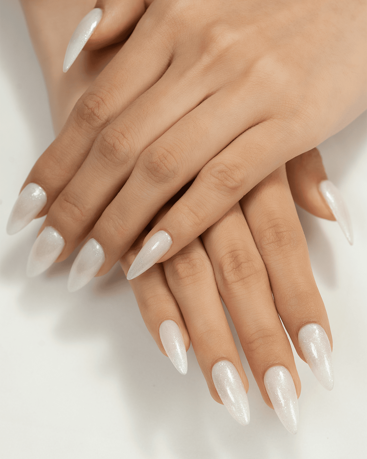 A hand with almond nails shape