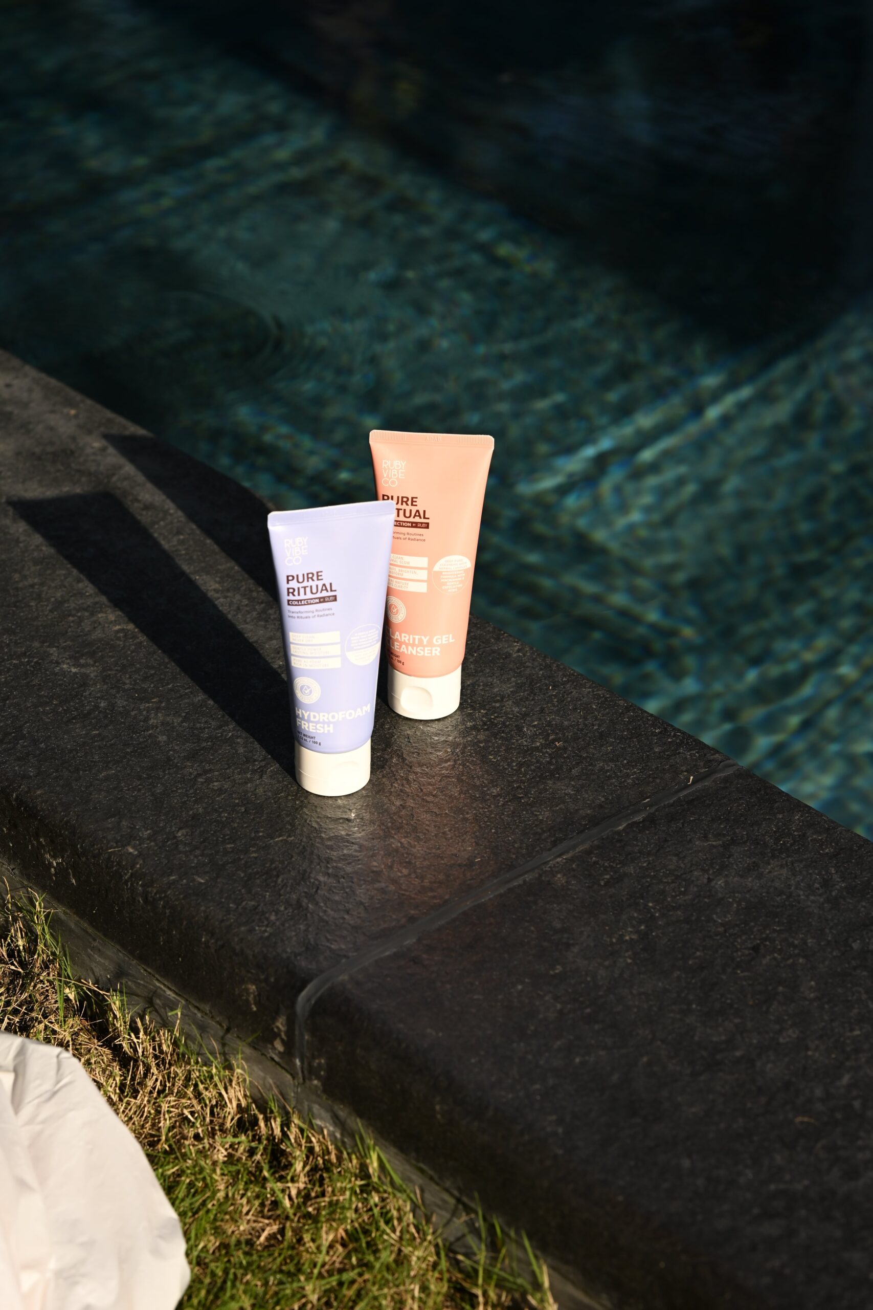 A product shot of two 'Pure Ritual' cleansers in light purple and peach, representing different options for finding the right cleanser for various skin types.