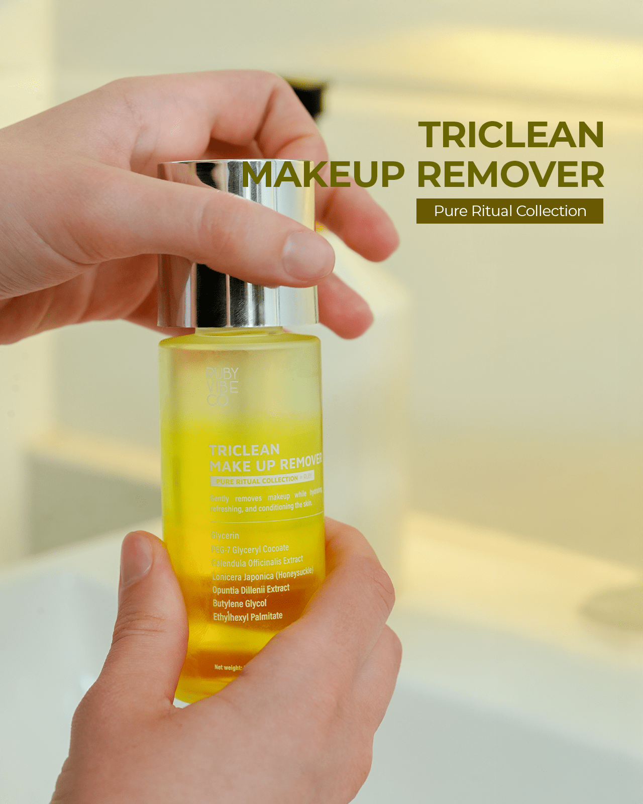 A person holds a yellow 'Triclean Makeup Remover' bottle, a crucial first step in a complete skin cleansing routine.