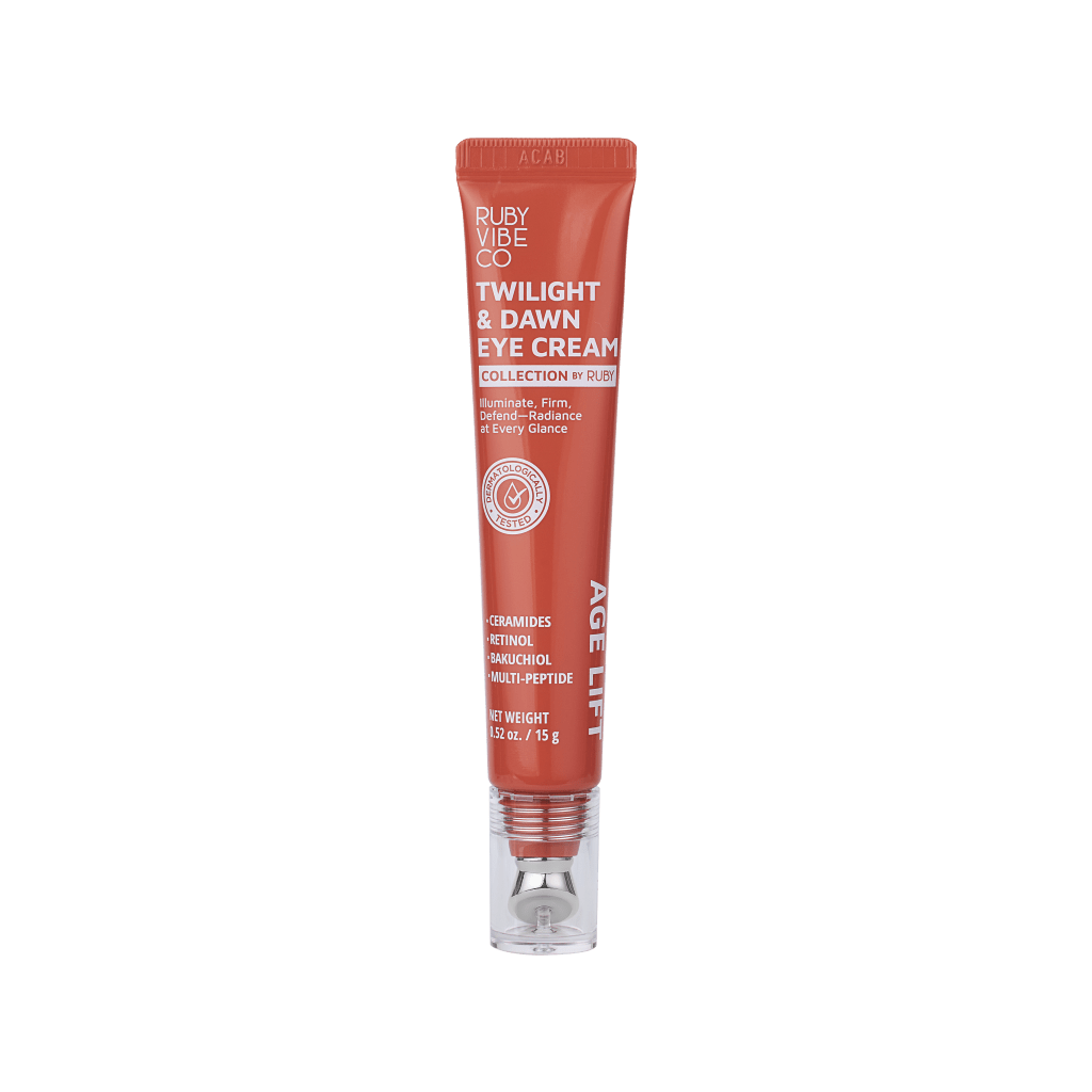 A red tube of Ruby Vibe Co Twilight & Dawn Eye Cream 