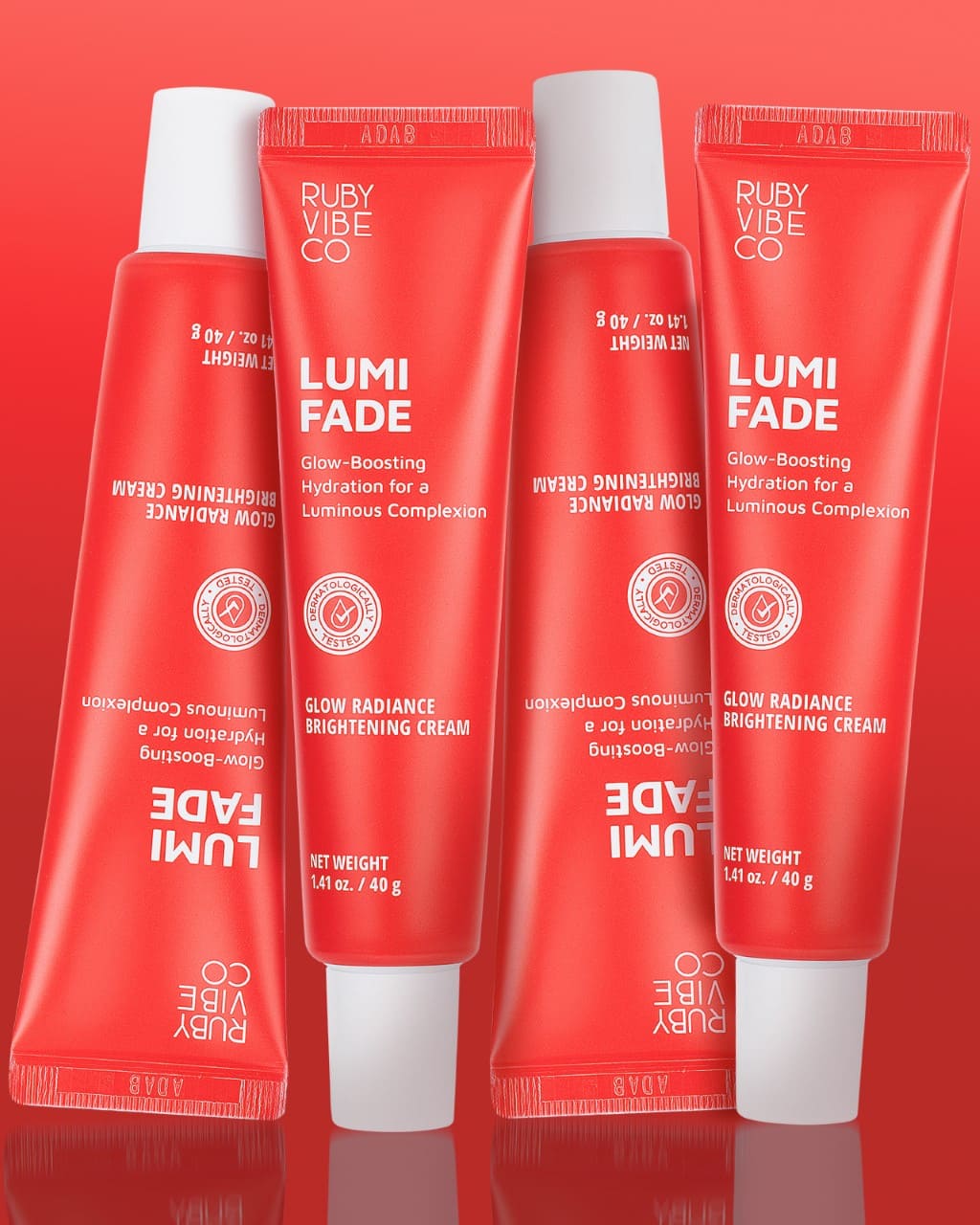 Four red tubes of Lumi Fade skin cream.