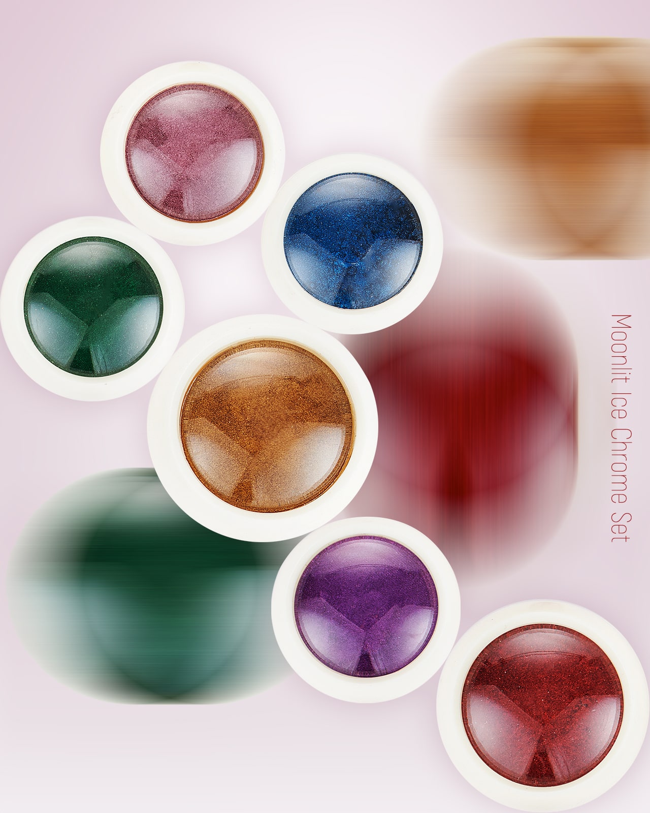 An overhead shot of six open jars of "Moonlit Ice Chrome Set," revealing a variety of metallic chrome powders in different colors like blue, green, and red.